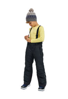 Front view of black Reima Jr Wingon Pants featuring a waterproof Reimatec shell, detachable elastic suspenders, reinforced knee and hem panels, and zippered hand pockets.