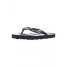 A grey and black striped Reima Junior Silota flip-flop sandal on a white background