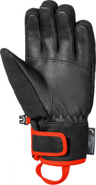 Reusch Worldcup Warrior R-TEX® XT JR Race Glove featuring a waterproof R-TEX® XT membrane, goatskin leather palm, reinforced knuckle protection, and junior race performance.