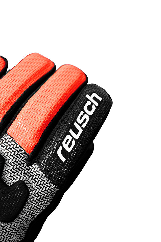 Reusch Worldcup Warrior R-TEX XT JR Race Glove with composite knuckle protection, finger padding and goatskin palm.