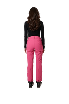 A woman wearing a pair of pink RH+ Women's Slim Ski Pants that are waterproof, breathable, stretchable, and insulated.