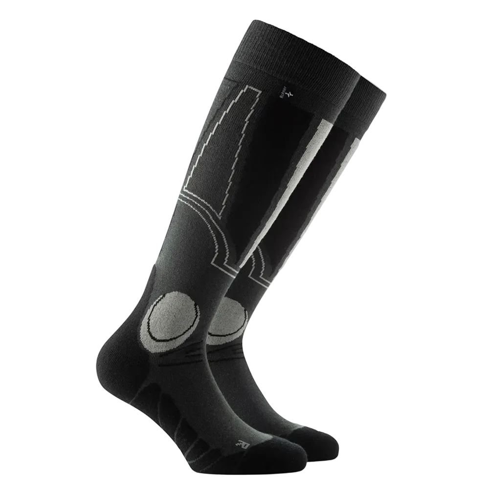Anatomical L/R-specific Rohner Carving Socks featuring over-the-calf height, targeted shin and ankle cushion zones, footbed ventilation channels, and seamless toe knit construction.