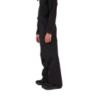 Side view of the black Rossignol Jr Boys’ Insulated Ski Pants featuring waterproof membrane fabric, synthetic insulation, adjustable waist tabs, integrated boot gaiters, and reinforced hem scuff guards.