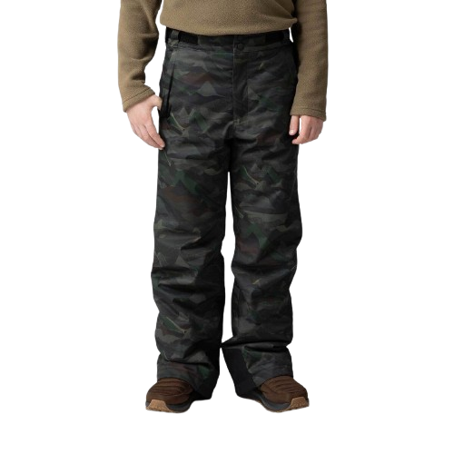 A boy wearing a pair of camo print Rossignol Boys' Ski Pants that are waterproof, breathable, stretchable, and insulated.
