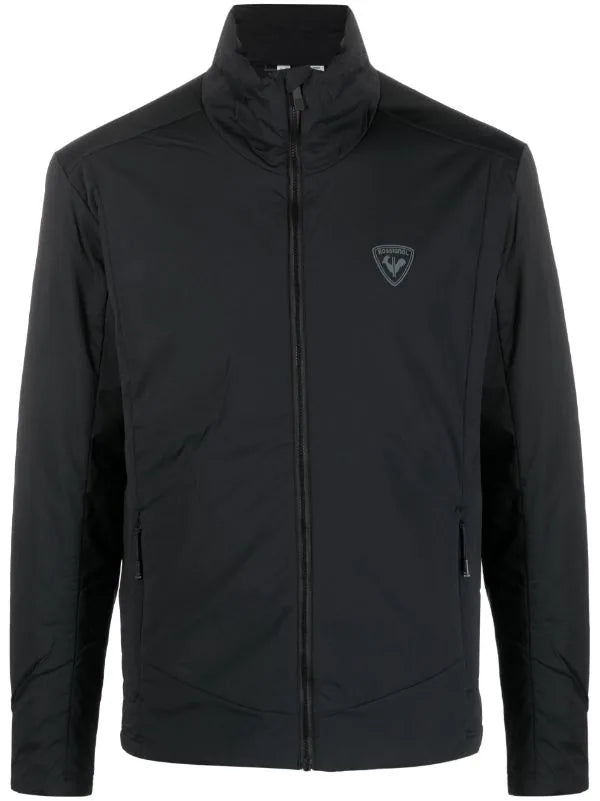 A black Rossignol Men's Opside Jacket with a full zipper, tailored fit, and preshaped sleeves.
