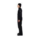 Side view of black Rossignol Men’s Outerlimits Insulated Bib Pants featuring high-chest bib construction, waterproof membrane fabric, adjustable shoulder suspenders, zippered thigh vents, integrated boot gaiters, and reinforced hem scuff guards.