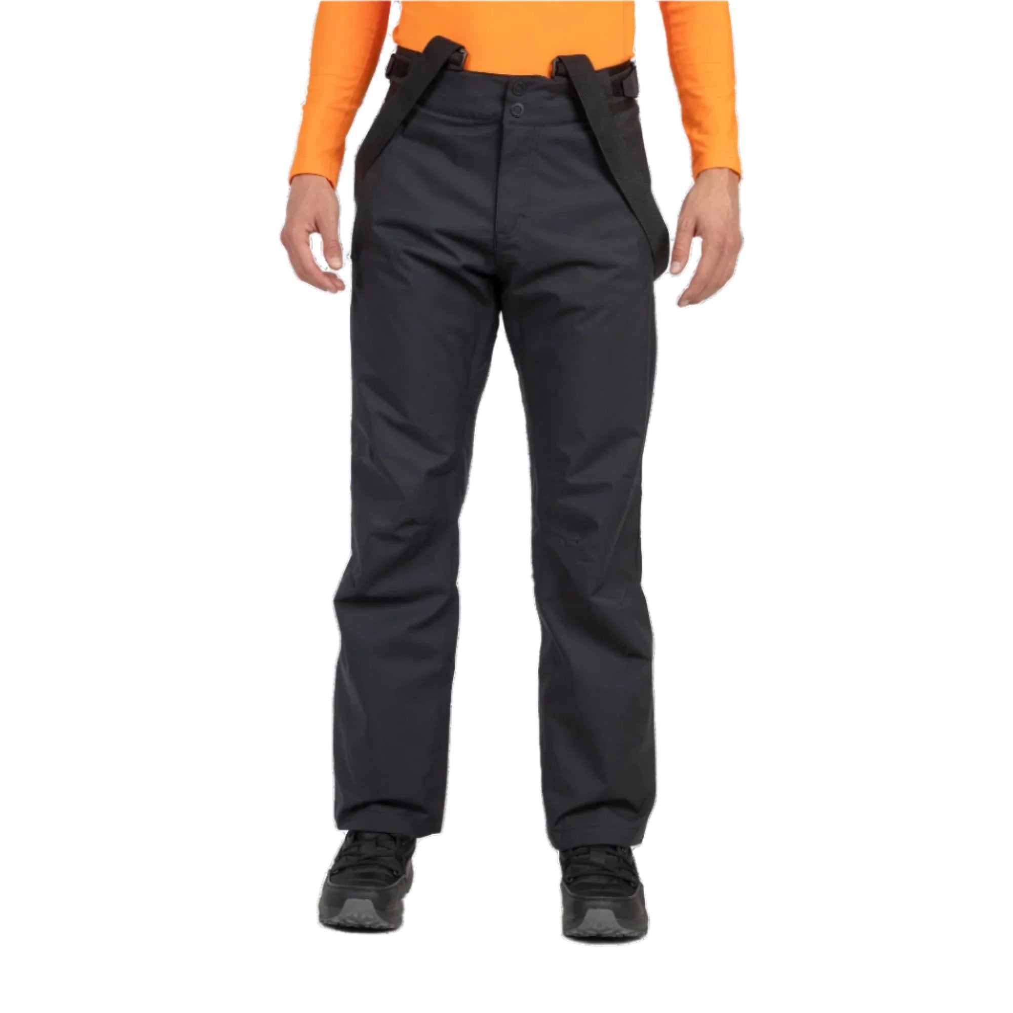 A man wearing a pair of black Rossignol Men's Ski Pants that are waterproof, breathable, stretchable, and insulated.