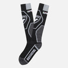 A pair of black and grey Rossignol Speed Comfort Ski Socks that are made from a merino wool blend.
