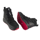 A pair of Rossignol unisex podium black après ski boots with red accents and a rubber outsole.