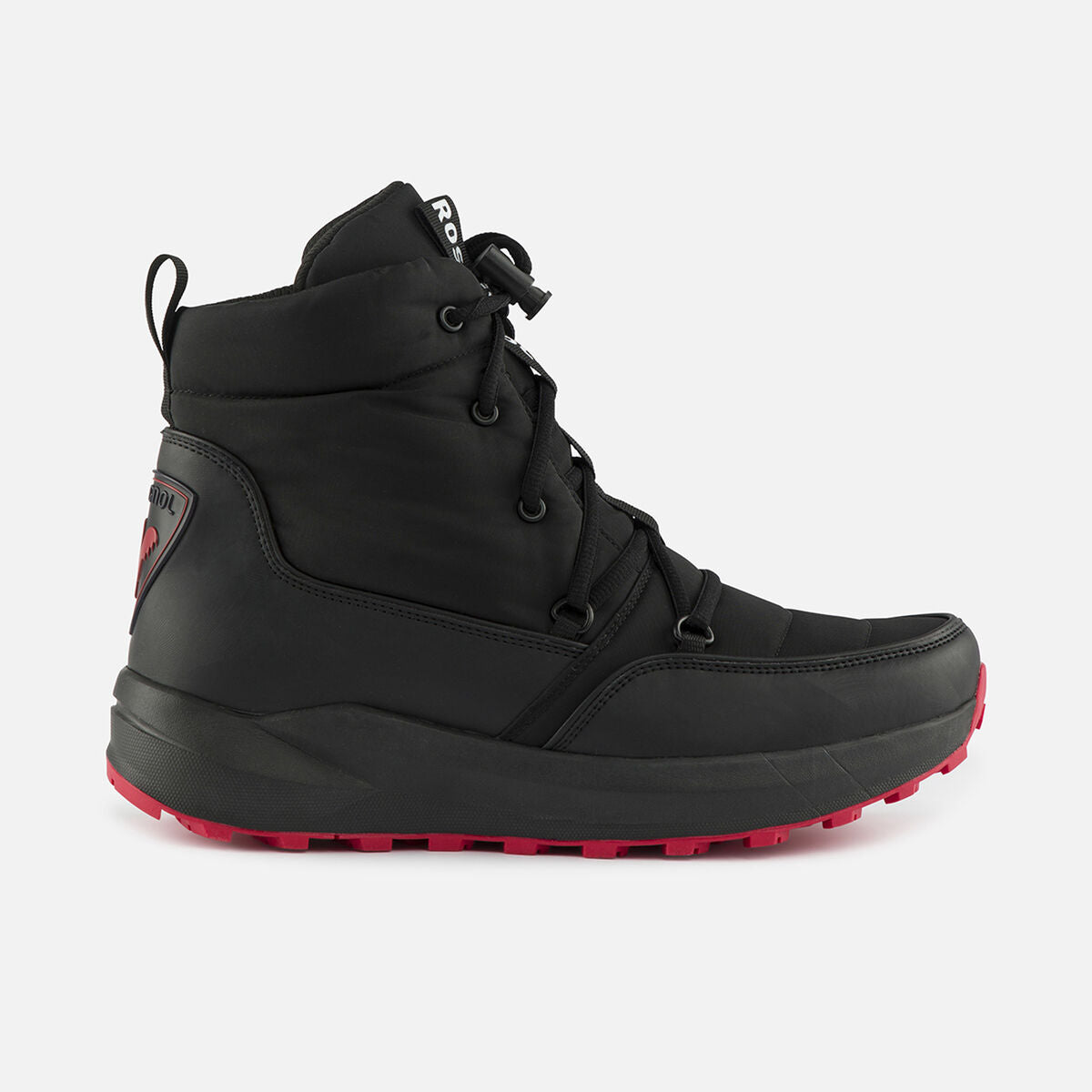 A Rossignol unisex podium black après ski boot with red accents and a rubber outsole.