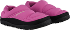 Side view of a pink Rossignol Women’s Chalet Shoes featuring a water-resistant insulated upper, slip-on stretch cuff with heel pull tab, cushioned EVA midsole, and high-traction rubber outsole.
