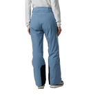 Rear view of the blue aura Rossignol Women’s Strawpile Insulated Pants featuring waterproof membrane fabric, recycled synthetic insulation, adjustable waist tabs, integrated boot gaiters, and reinforced hem scuff guards.