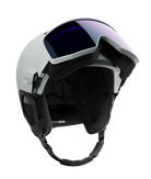 Salomon Driver Prime Sigma Plus Mips Helmet showing a hybrid shell with top ventilation ports, an integrated mirrored visor lens with a gradient tint, padded ear covers, and an adjustable chin strap system.