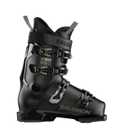 A Salomon S/PRO Delta 100 ski boot in black with gold lettering and silver buckles, that features a sturdy construciton and GripWalk soles, shown from a side profile.
