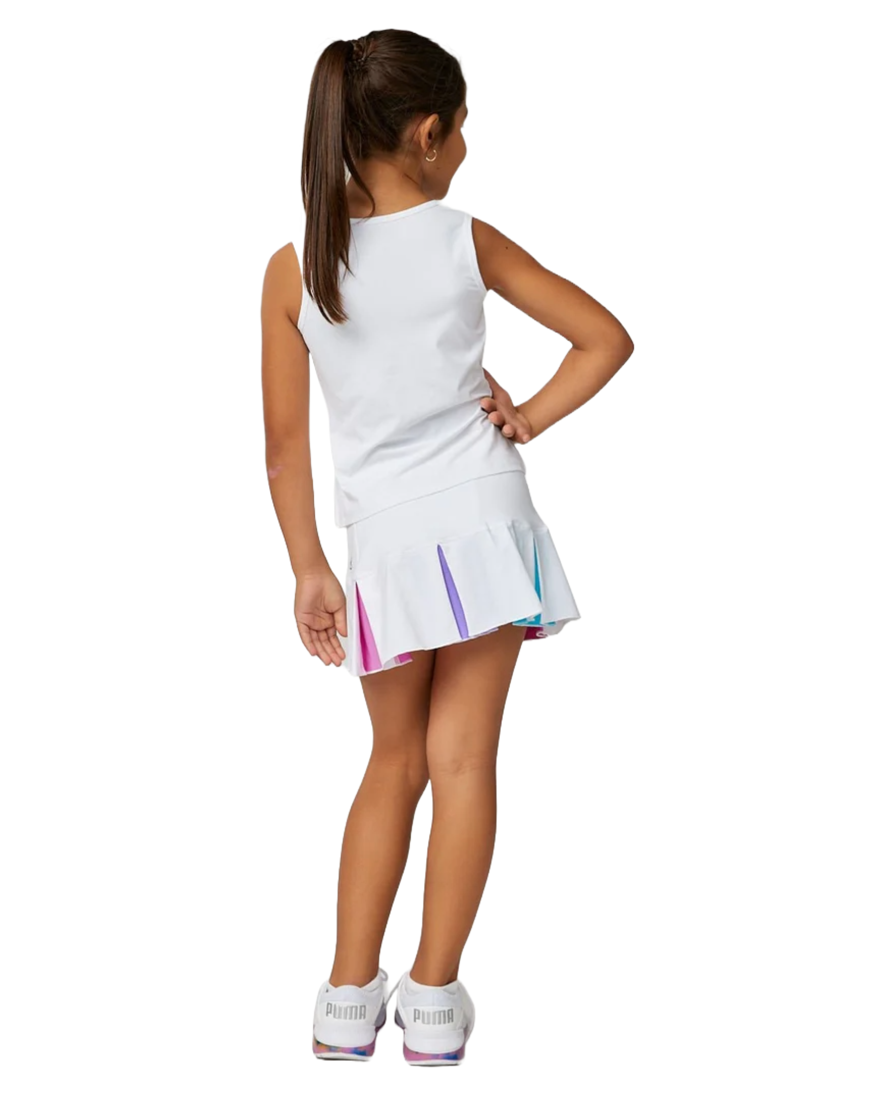 A girl wearing a white Sofibella Girls Spectrum Tank Top and skirt on a white background.