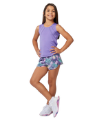  A girl wearing a purple Sofibella Girls UV Tank Top on a white background