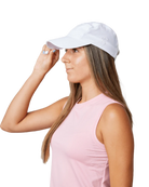 A woman wearing a white Sofibella Staples Snap Cap on a white background.