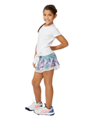 A girl wearing a white Sofibella UV Girls Cap Sleeve Tie T-Shirt on a white background
