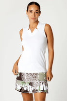 Sofibella Women's Sleeveless Golf Polo featuring lightweight performance fabric, a classic collar, and a flattering athletic fit.