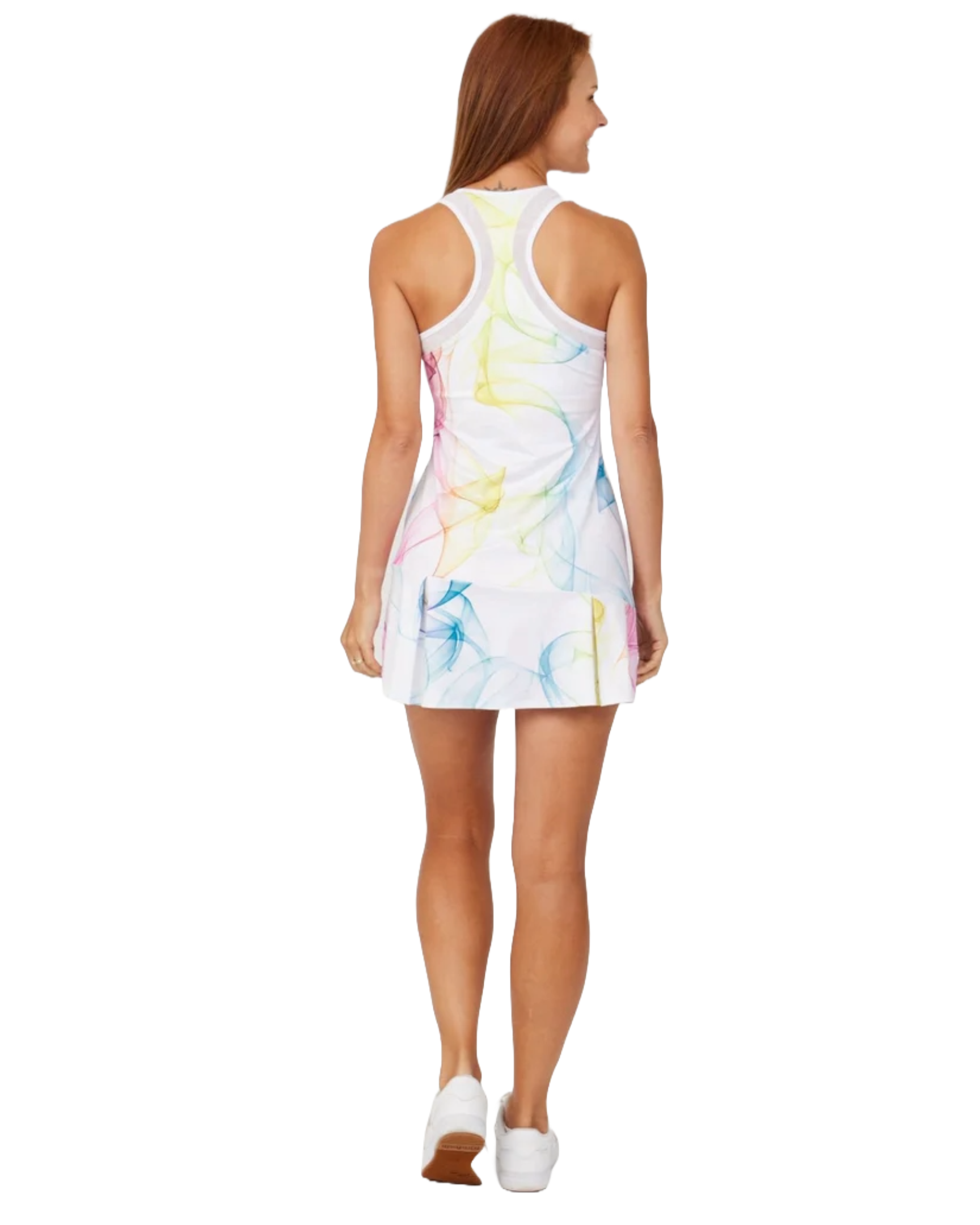 A woman wearing a Sofibella Women's Spectrum 32" Dress that features a fun multicolour design that's made from moisture-wicking, quick-drying, and stretchable fabric.