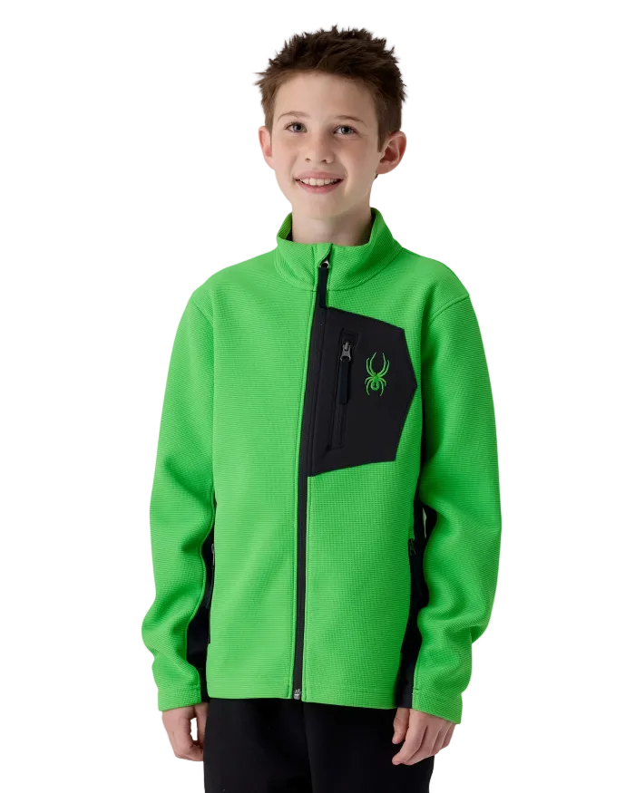 A boy wearing a green Spyder Boys’ Bandit Fleece Sweater Jacket featuring lightweight sweater-knit bonded fleece, stretch fleece side panels, brushed interior lining, and full-length YKK® center front zipper.