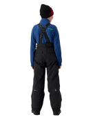 A boy wearing a Spyder Boys’ Propulsion Pants featuring EXO SHIELD 10K stretch recycled polyester shell, 60g ThermaWEB insulation, critically taped seams, removable adjustable suspenders, and inner snow gaiters.