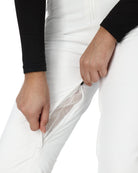 A close up of the ventilation of a pair of white Spyder Women's On Piste Ski Bib Pants which are waterproof, breathable, stretchable, and insulated.
