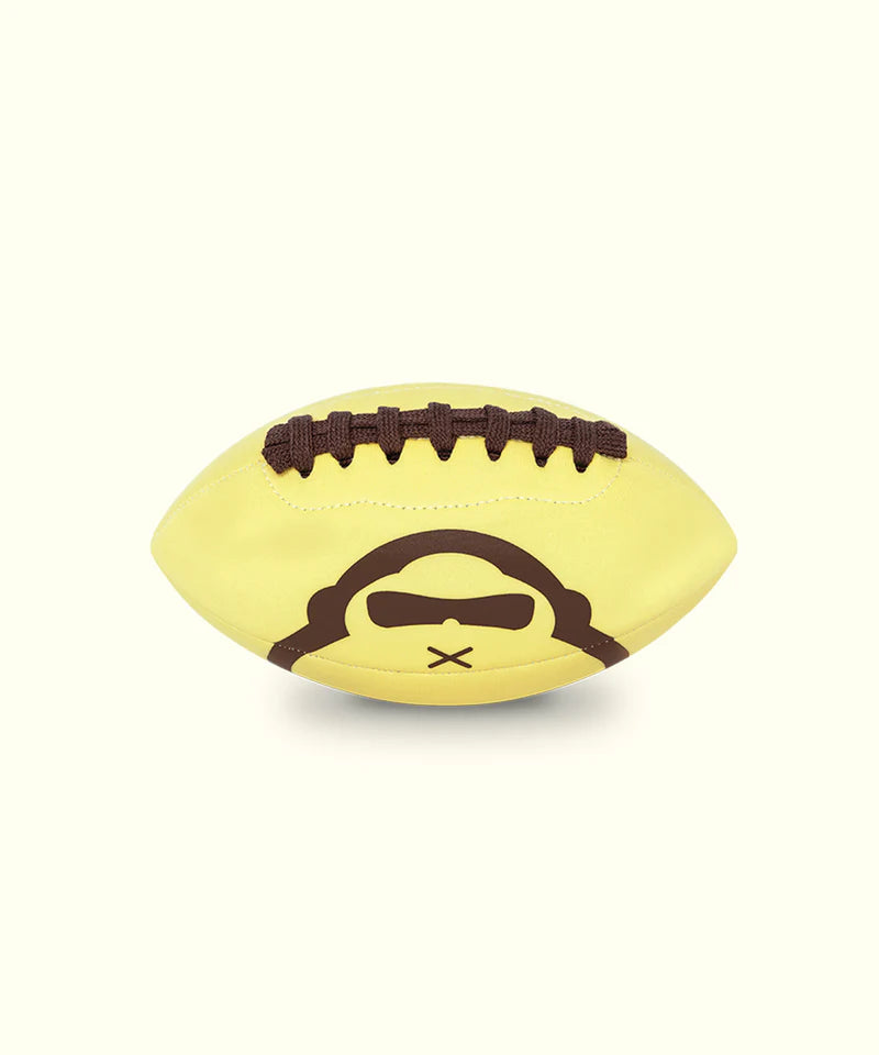 Yellow Sun Bum football with a Sun Bum logo on a white background