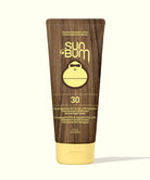Sun Bum Original SPF 30 sunscreen lotion tube with wooden design and yellow label on a white background