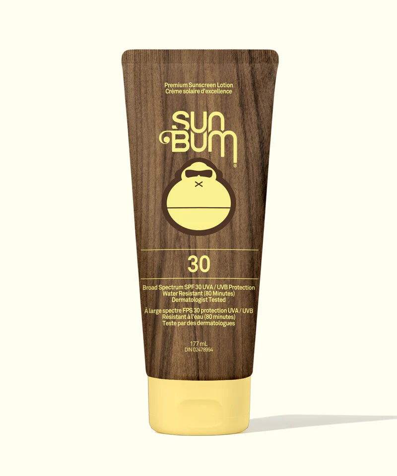Sun Bum Original SPF 30 sunscreen lotion tube with wooden design and yellow label on a white background