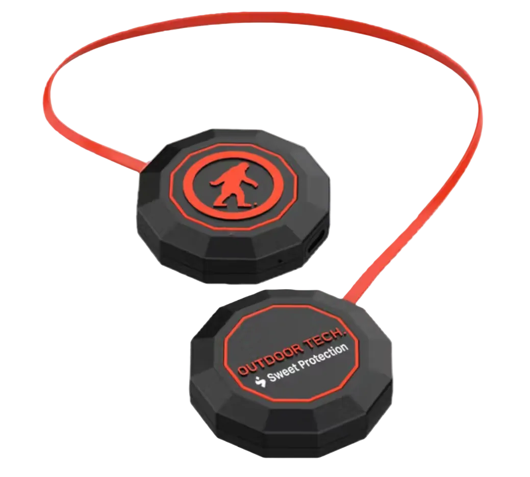 Sweet Protection Audio Chips XV showing slim round drop-in helmet speakers, low-profile tapered housing, glove-friendly push-button controls, integrated microphone port, and USB-C charging connector.