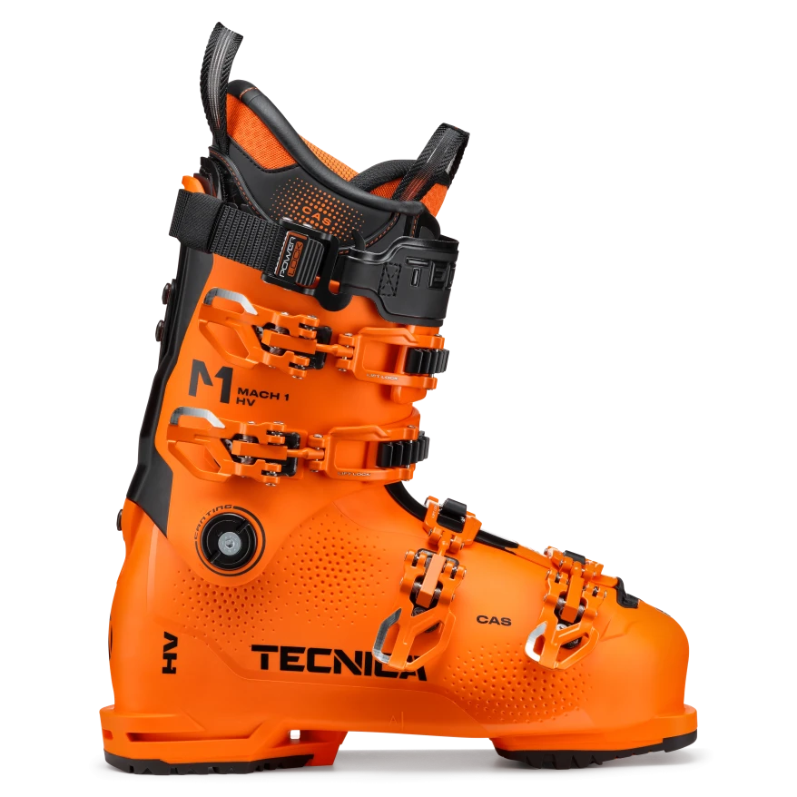 Orange Tecnica Mach 1 HV 130 ski boot with multiple buckles and black detailing.