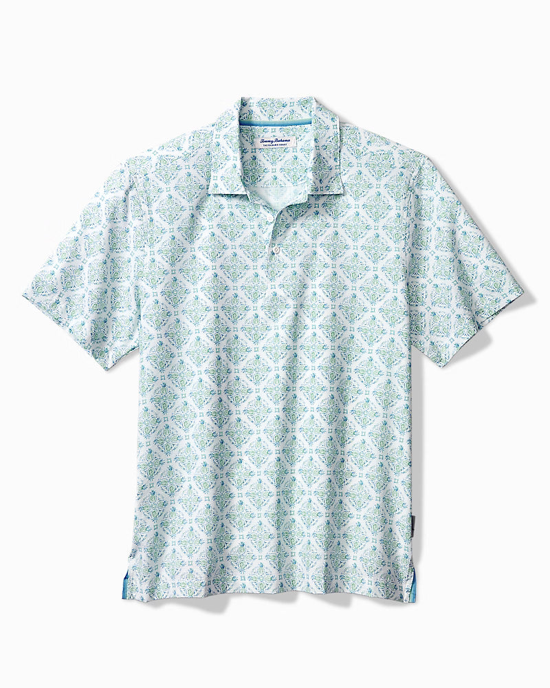 Tommy Bahama Men's Bahama Coast Pina Islands Golf Polo featuring a tropical print, performance stretch fabric, and classic polo styling.