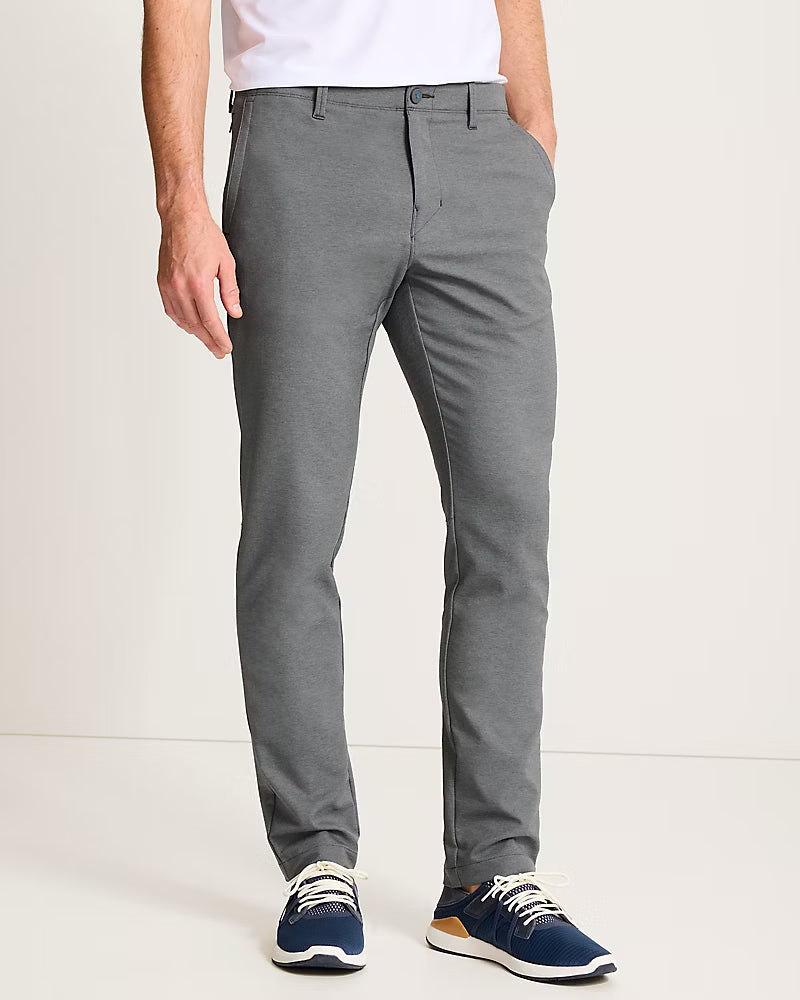 Tommy Bahama Men's On Par Flat Front Golf Pants featuring lightweight stretch fabric, classic flat-front styling, and all-day comfort.