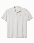 Tommy Bahama Men's Palm Dunes Golf Polo featuring lightweight performance fabric, stretch comfort, and a tropical-inspired pattern.