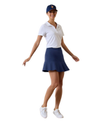 Tommy Bahama Women's Abby Flounce Golf Skort featuring a flounce hem, lightweight stretch fabric, built-in shorts, and a flattering fit.