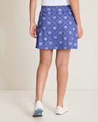 Tommy Bahama Women's Abby Getaway Fronds Skort featuring a tropical print, lightweight stretch fabric, built-in shorts, and flattering styling.