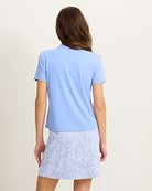 Tommy Bahama Women's Abby Short Sleeve Polo featuring breathable stretch fabric, classic polo styling, and a flattering feminine fit.