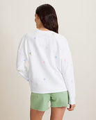 Tommy Bahama Women's Marina Del Mar Palm Tree Crew featuring a relaxed fit, classic crew neckline, and coastal palm tree graphic.
