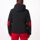 A man wearing a black and red Toni Sailer Men's Matti Ski Jacket made from premium fabrics and insulation that is waterproof, breathable, stretchable, insulated, and fashionable.