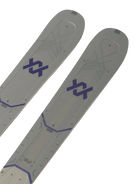 A pair of white and purple 2027 Volkl Mantra 84 W skis that are designed for advanced female skiers.