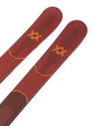 A pair of red and black 2027 Volkl Mantra Jr skis that are designed for all-mountain skiing.