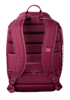 A Wilson Defyer Tennis Backpack showing water-resistant polyester exterior, rear locking 2-racquet compartment, ventilated bottom shoe pocket, thermoguard side pocket, and padded mesh shoulder straps.