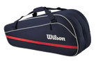 A navy blue Wilson Team 6 Pack racket bag that is designed to hold up to 6 tennis rackets.