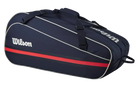 A navy blue Wilson Team 6 Pack racket bag that is designed to hold up to 6 tennis rackets.
