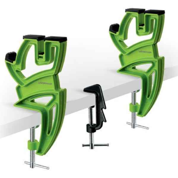 A Wintersteiger Ski Vise Sport Plus showing three-piece high-tensile aluminum body, adjustable central clamping jaw with 60-degree edge tuning capability, rubber grip pads, and two end supports with integrated brake retainers.